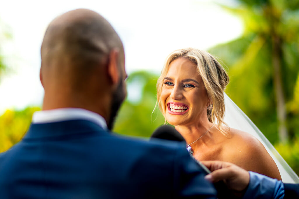 Bride and groom reading vows