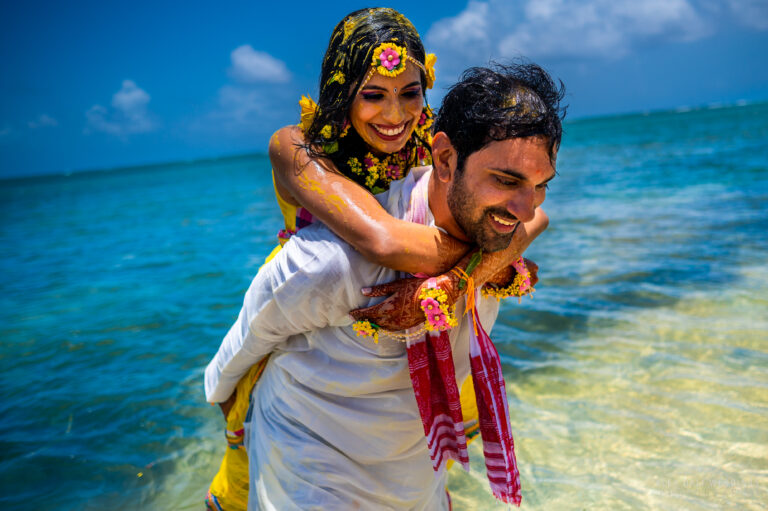 Indian Wedding couple celebrating Haldi at Hyatt Grand Reserve on San Juan Beach