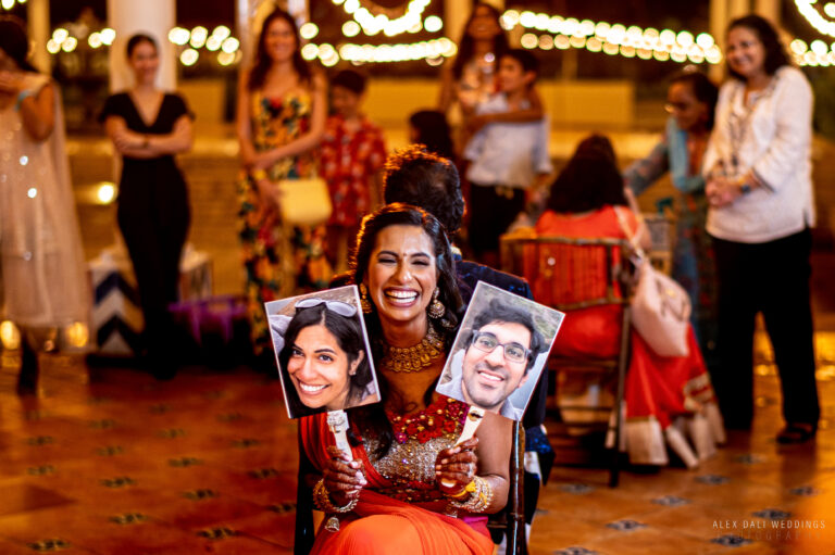 Indian wedding couple playing games during their sangeet celebration at Hyatt Grand Reserve in San Juan